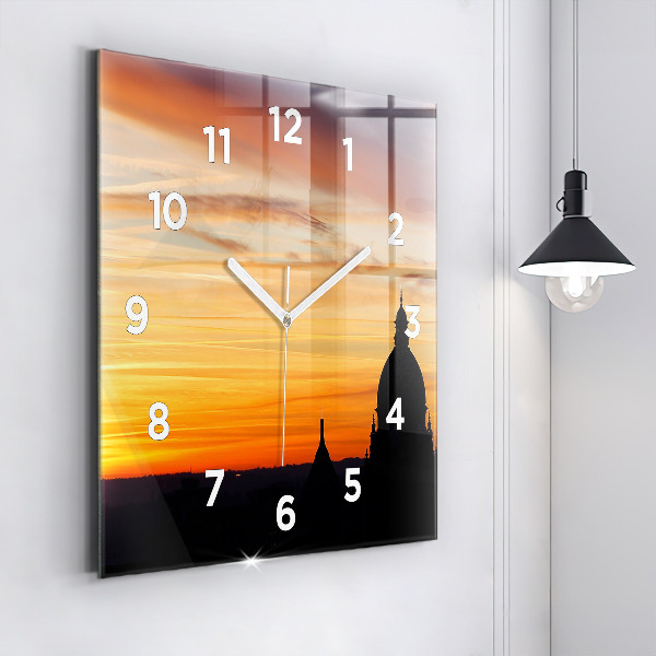 Square glass wall clock Building and sunset
