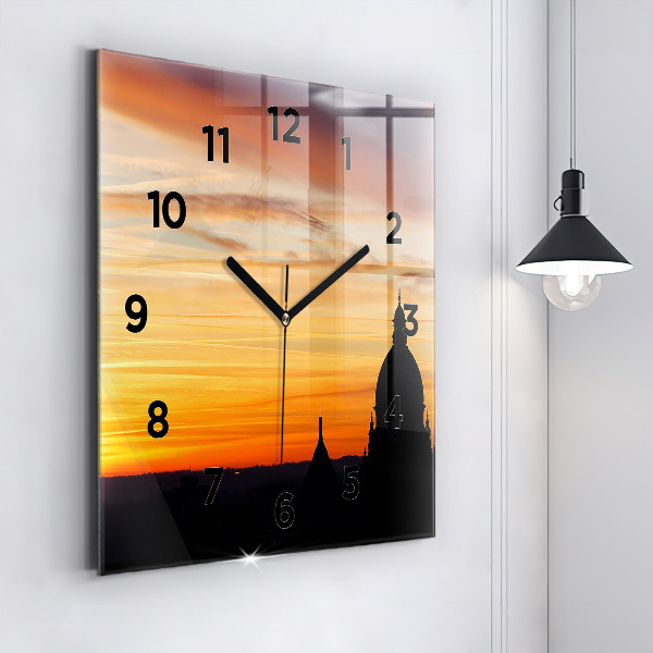 Square glass wall clock Building and sunset