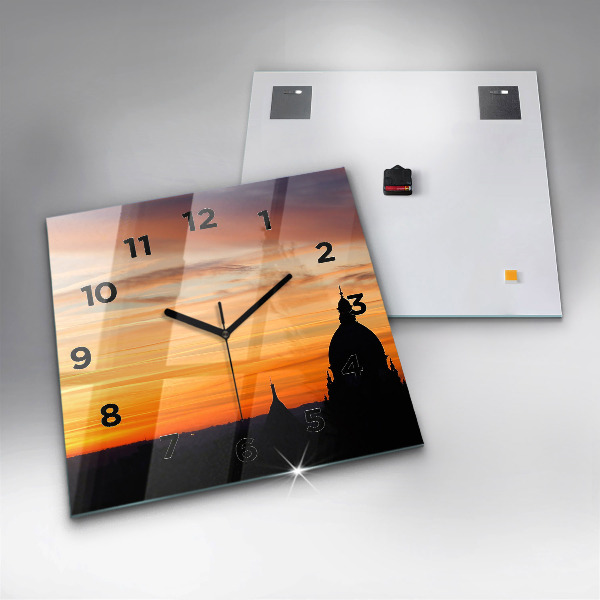 Square glass wall clock Building and sunset