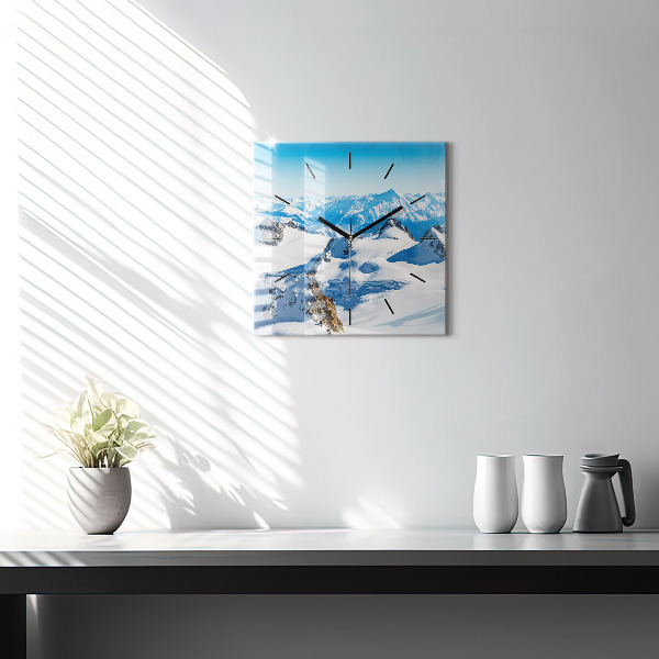 Square glass wall clock Skier in the Alps