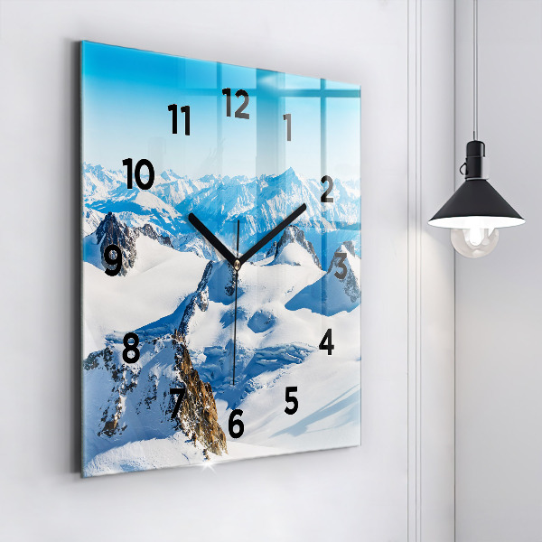 Square glass wall clock Skier in the Alps