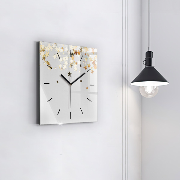 Square glass wall clock Stars on a light background