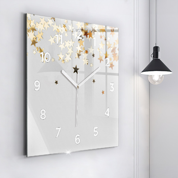 Square glass wall clock Stars on a light background