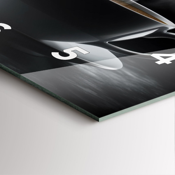 Square glass wall clock A cup of black coffee