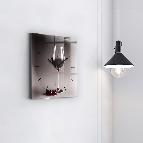 Square glass wall clock A glass of red wine