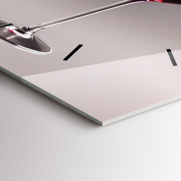 Square glass wall clock A glass of red wine