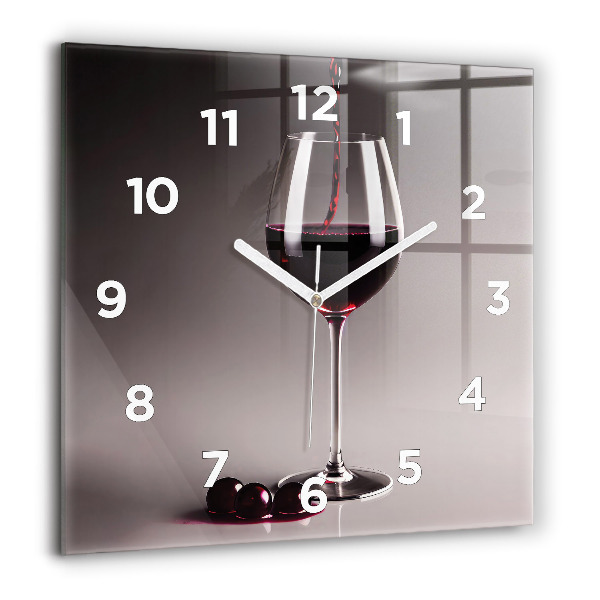 Square glass wall clock A glass of red wine