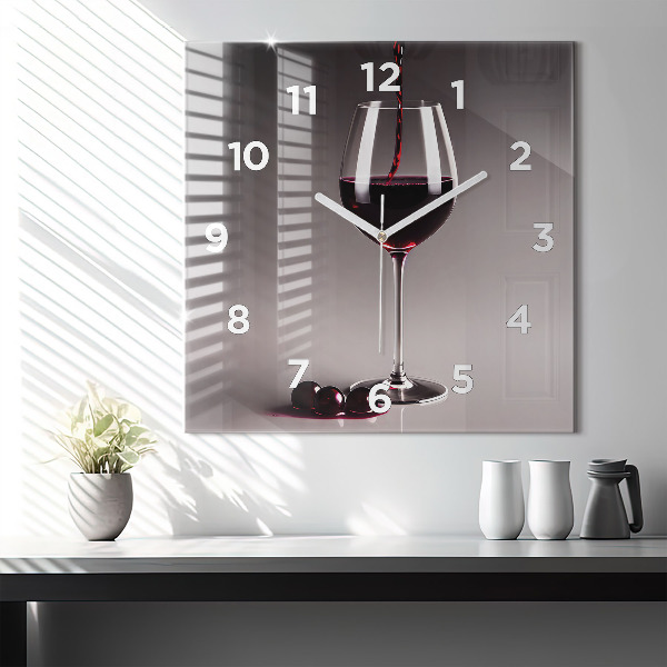 Square glass wall clock A glass of red wine