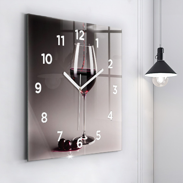 Square glass wall clock A glass of red wine