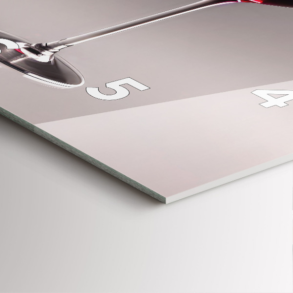 Square glass wall clock A glass of red wine