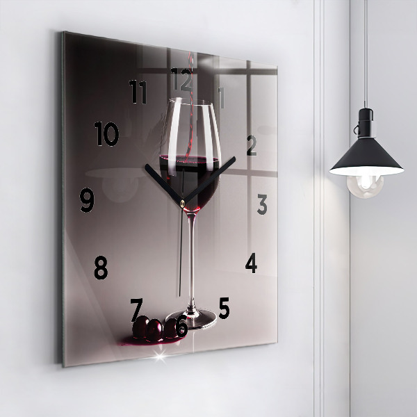 Square glass wall clock A glass of red wine