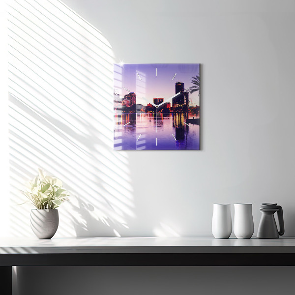 Square glass wall clock Evening panorama of the city