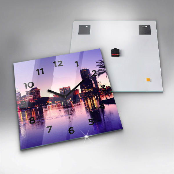 Square glass wall clock Evening panorama of the city