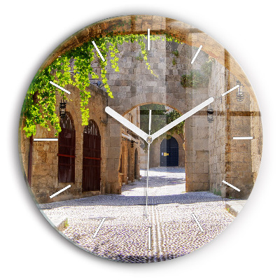 Round glass clock Picturesque street of Rhodes