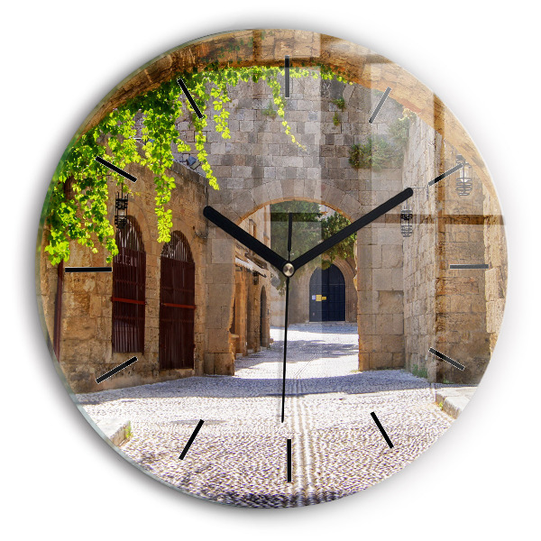 Round glass clock Picturesque street of Rhodes