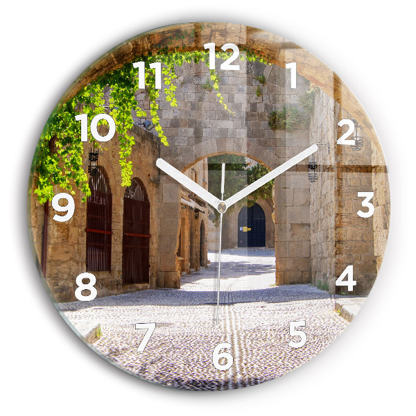 Round glass clock Picturesque street of Rhodes