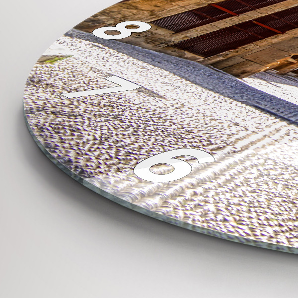 Round glass clock Picturesque street of Rhodes