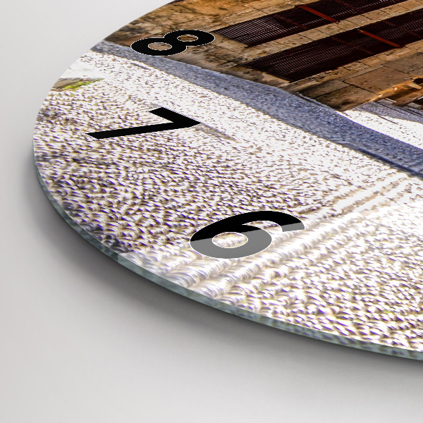 Round glass clock Picturesque street of Rhodes