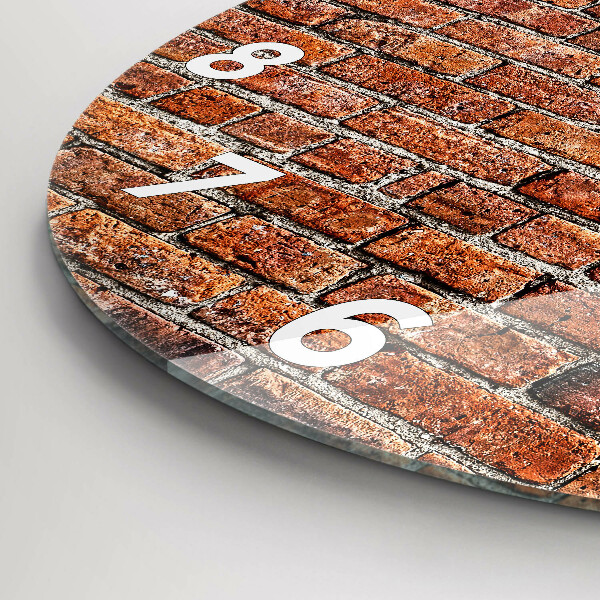 Round glass clock Old brick wall