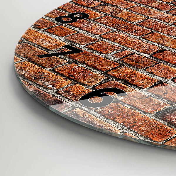 Round glass clock Old brick wall