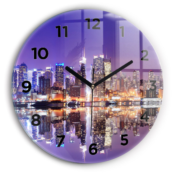 Round glass clock New York City at Night