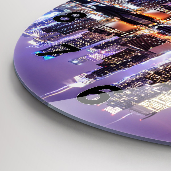 Round glass clock New York City at Night