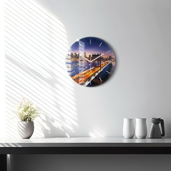 Round glass clock New York and the sunset