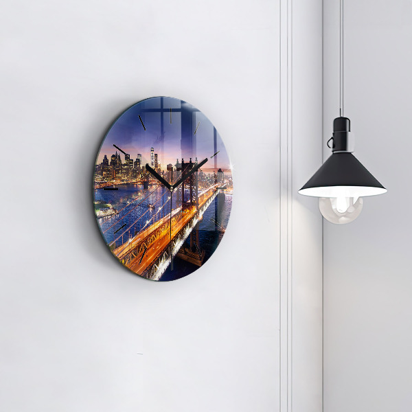 Round glass clock New York and the sunset