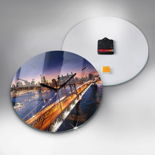 Round glass clock New York and the sunset