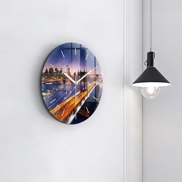 Round glass clock New York and the sunset