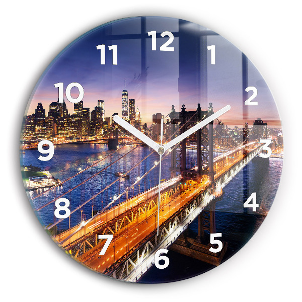 Round glass clock New York and the sunset