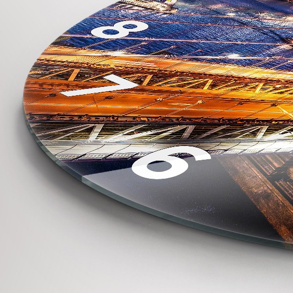 Round glass clock New York and the sunset