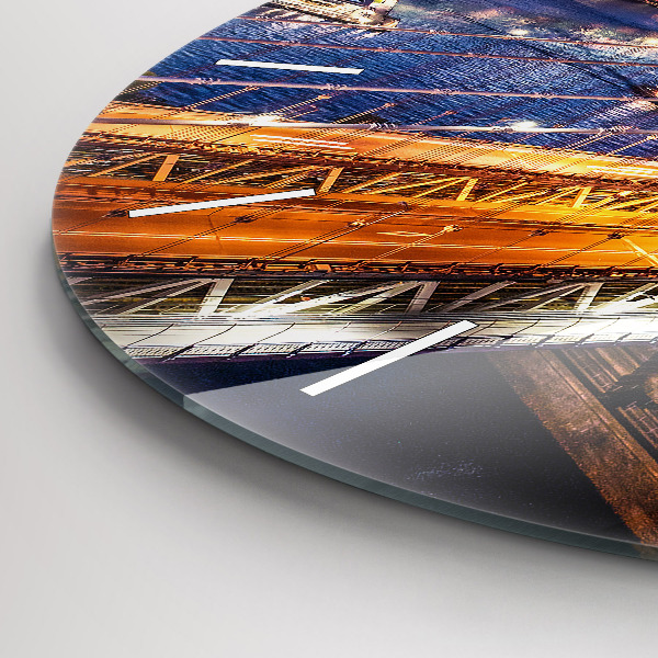 Round glass clock New York and the sunset