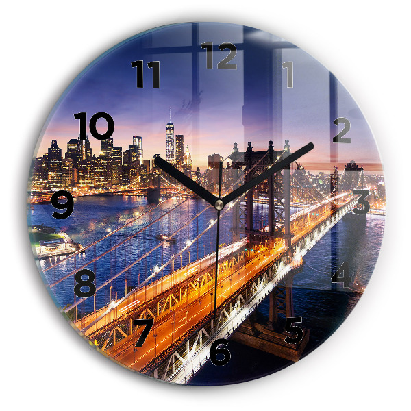 Round glass clock New York and the sunset