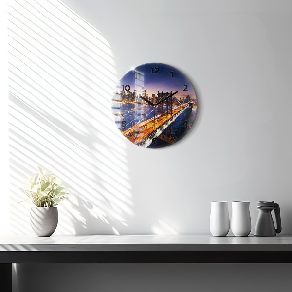 Round glass clock New York and the sunset