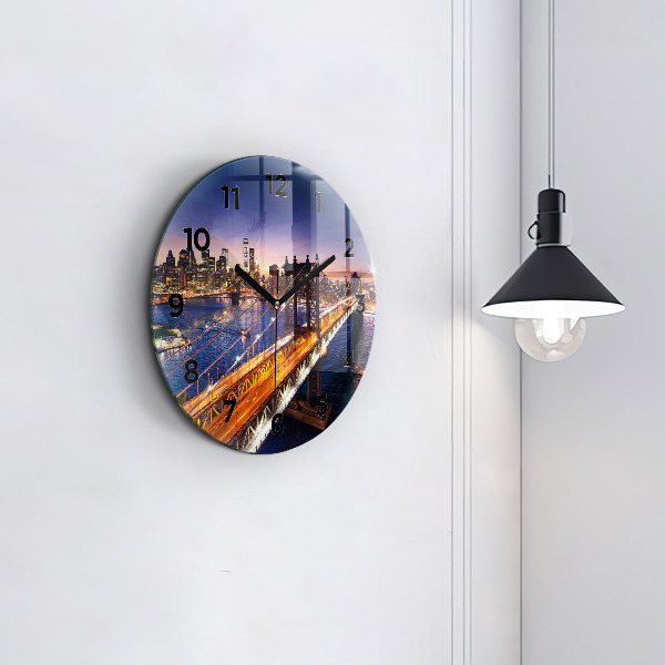 Round glass clock New York and the sunset