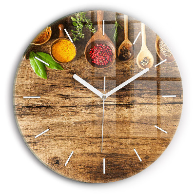 Round glass clock Spoons of spices