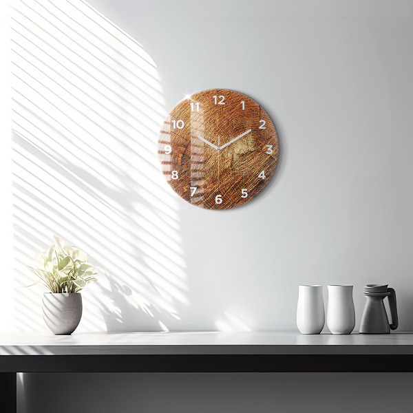 Round glass clock Old tree stump