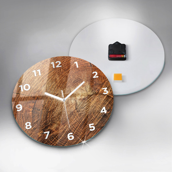 Round glass clock Old tree stump