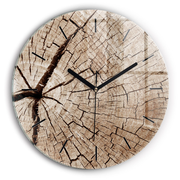 Round glass clock Old wood stump