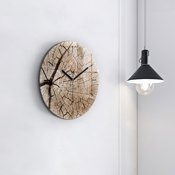 Round glass clock Old wood stump