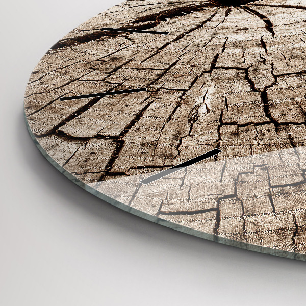 Round glass clock Old wood stump