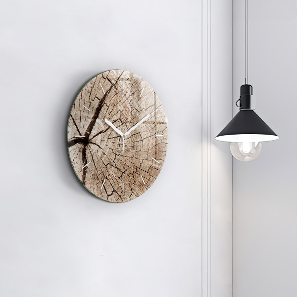 Round glass clock Old wood stump