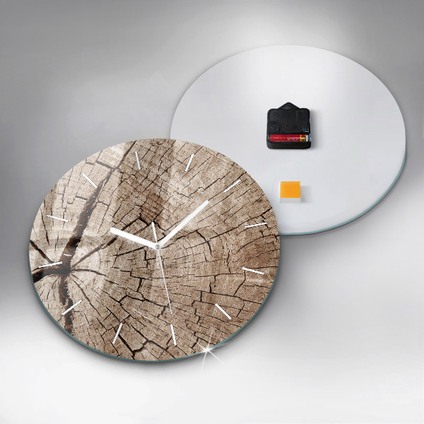 Round glass clock Old wood stump