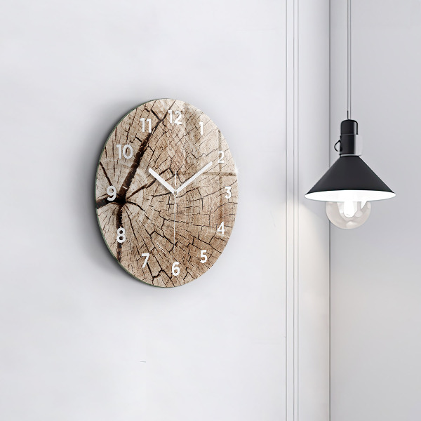 Round glass clock Old wood stump