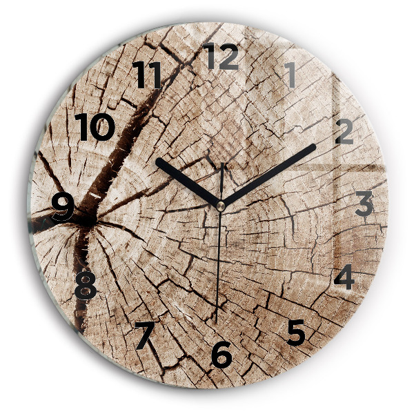 Round glass clock Old wood stump