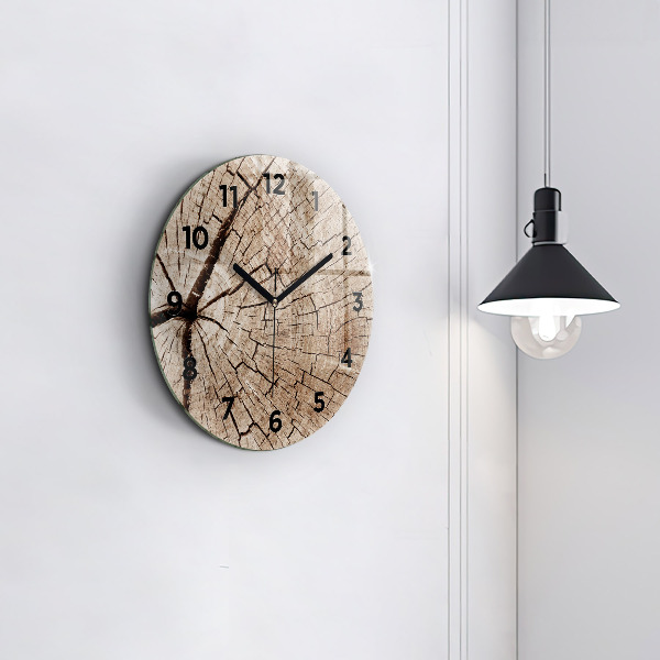 Round glass clock Old wood stump