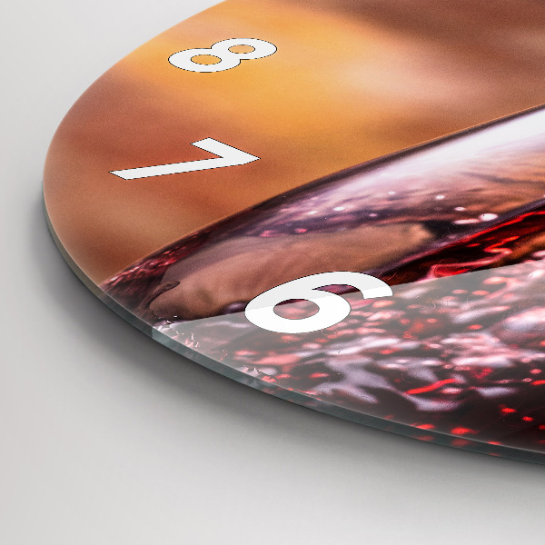 Round glass clock A glass of red wine