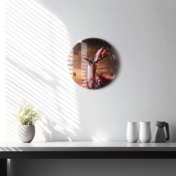 Round glass clock A glass of red wine