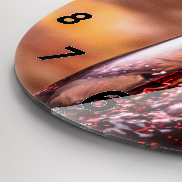 Round glass clock A glass of red wine